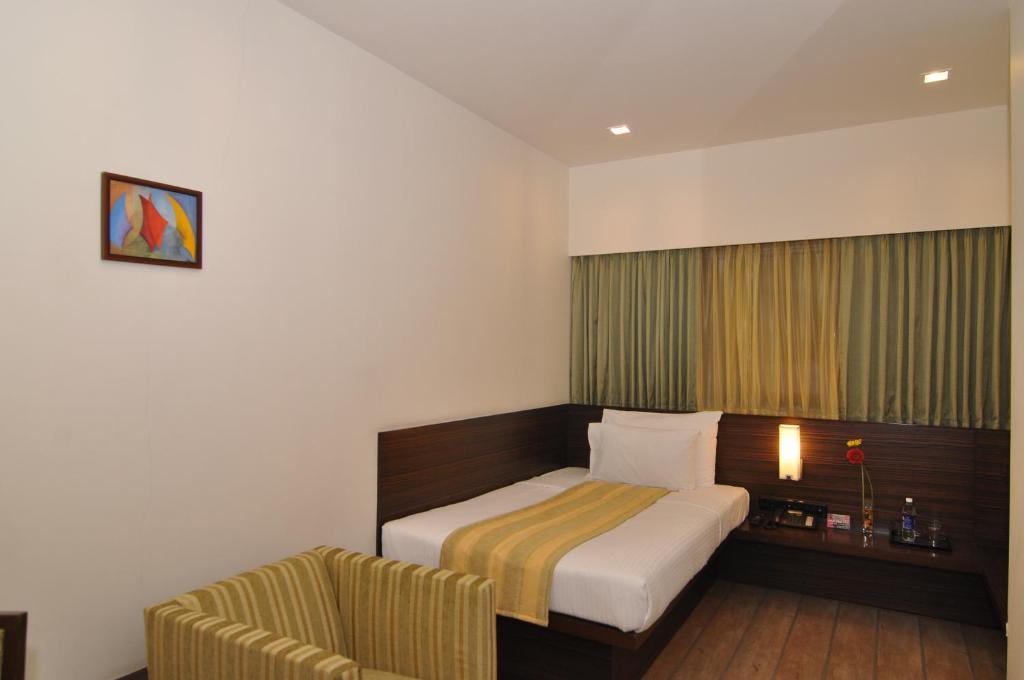 Hotel Studio Estique Pune Rum bild