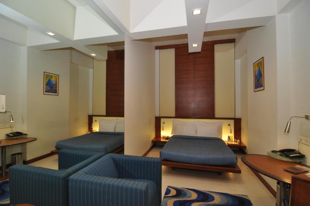 Hotel Studio Estique Pune Rum bild